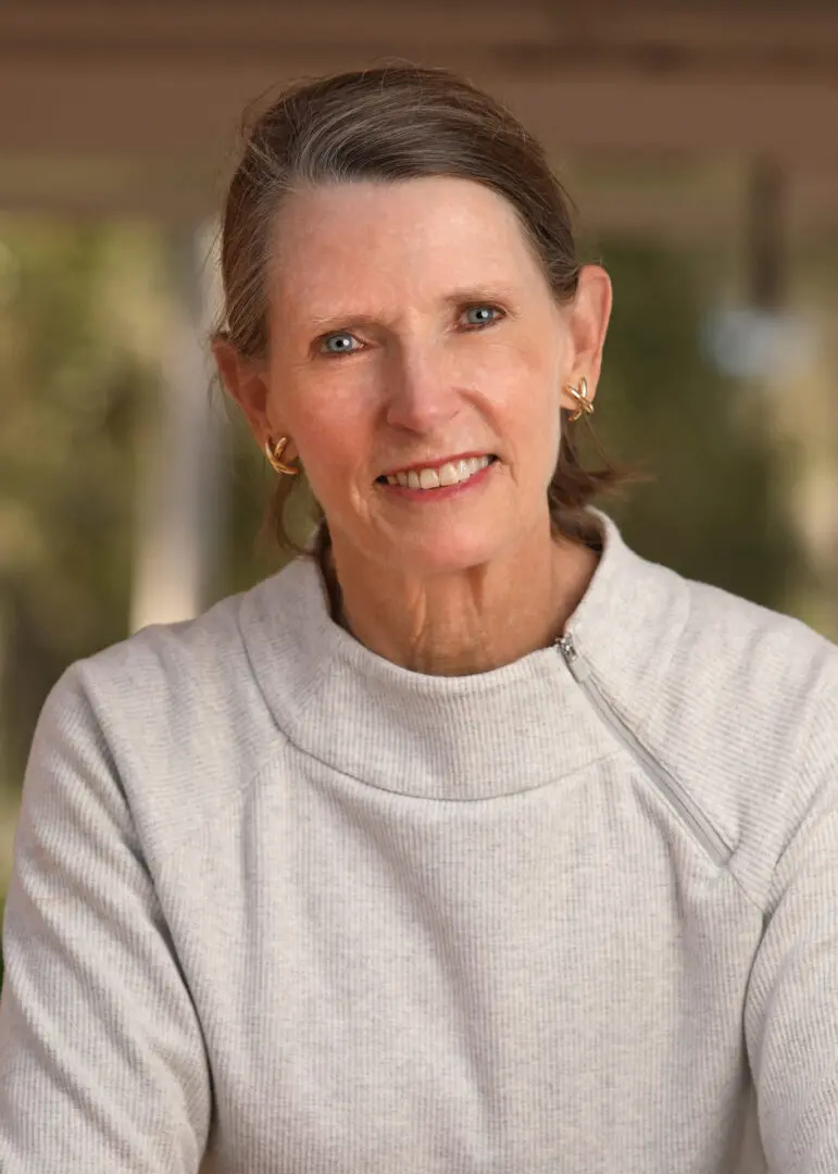 a portrait of a woman smiling